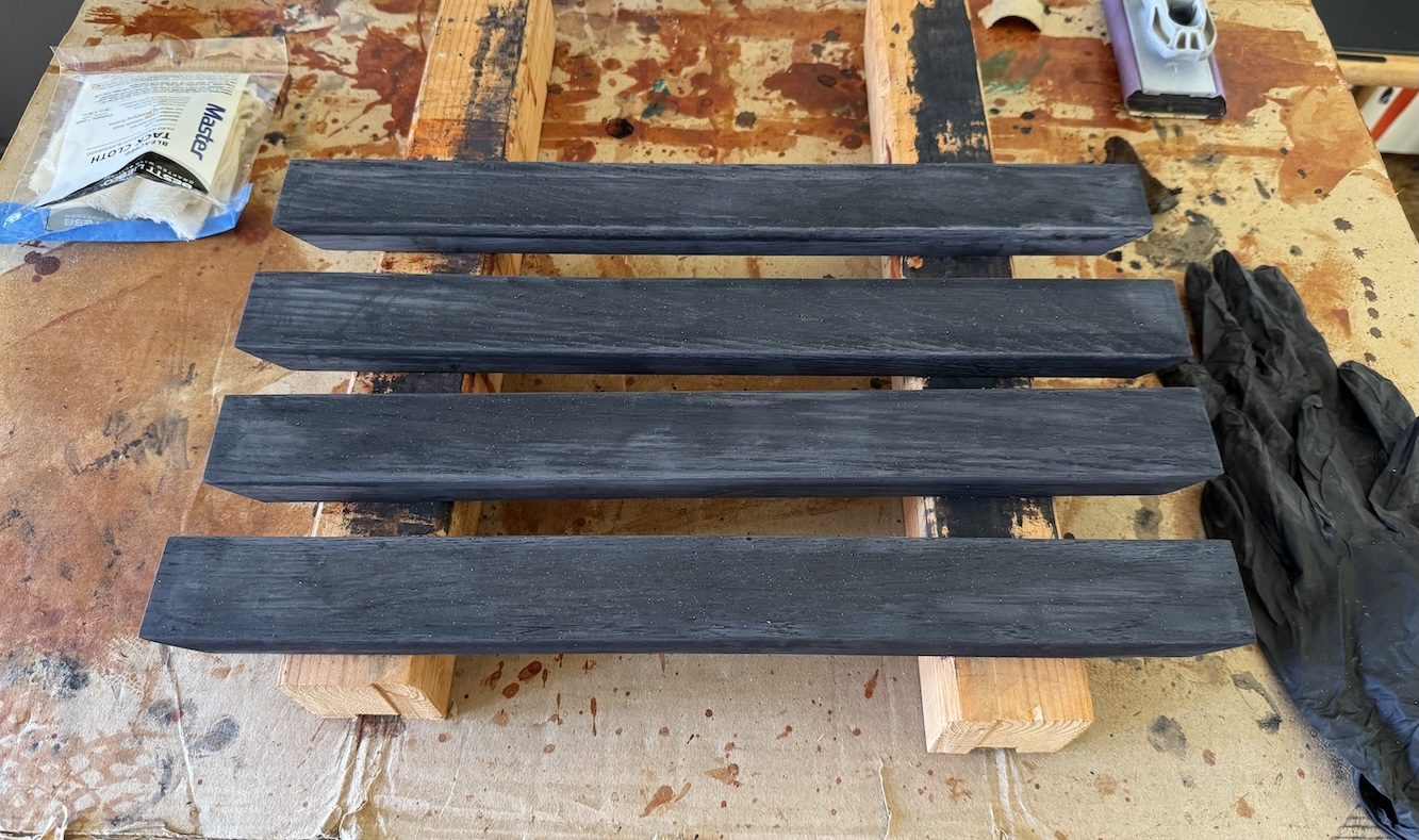 Ebonizing solution applied and mostly dried. Notice that it's more dark grey than black, and it's a bit splotchy -- this won't be a problem. This picture was about 30 minutes after the previous, and most of that time was just waiting for it to dry to reveal the true color.