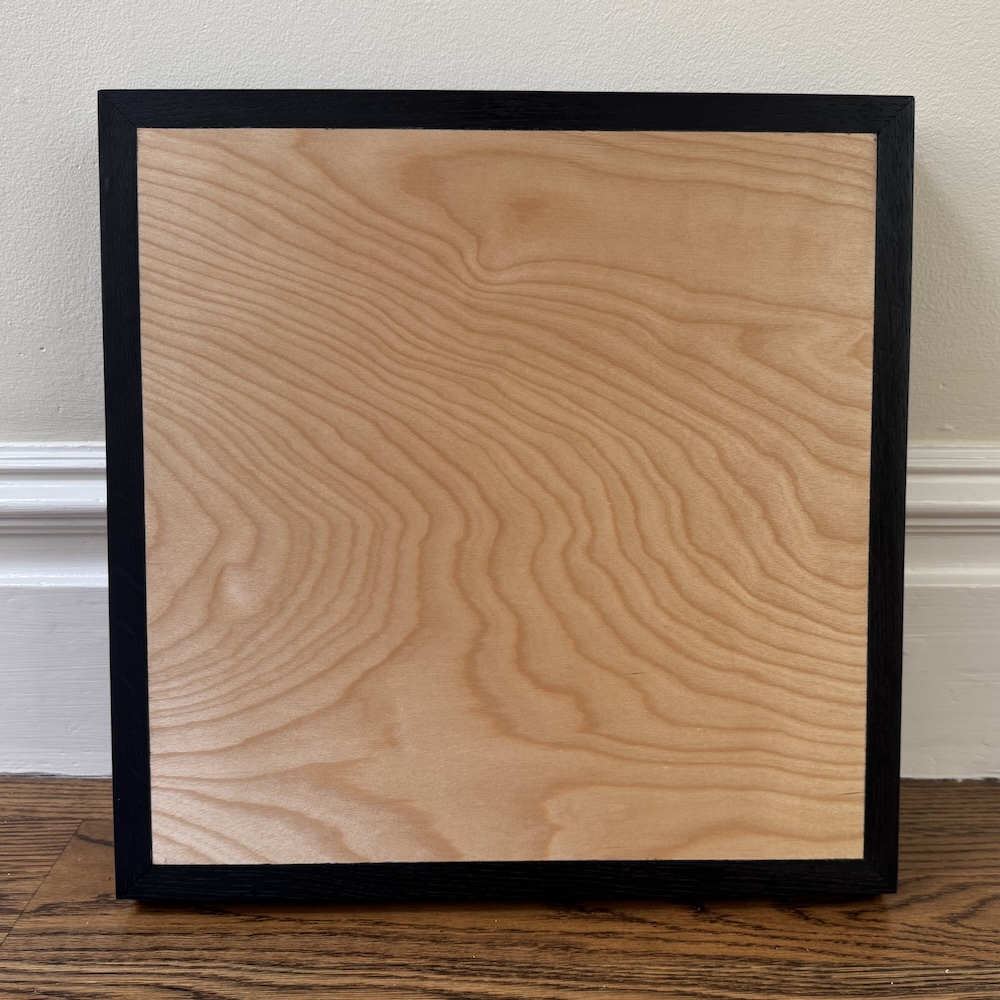 My finished piece: a side table with accented edges. I used three coats of warm gloss wipe-on polyurethane.